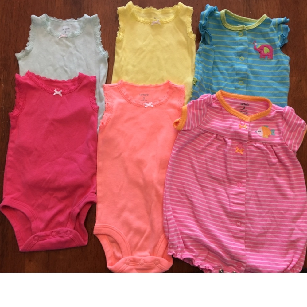Lot of six Carter’s baby girl onsies
